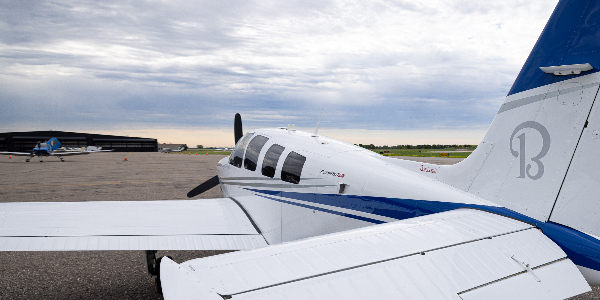 top rear view of plane on tarmac